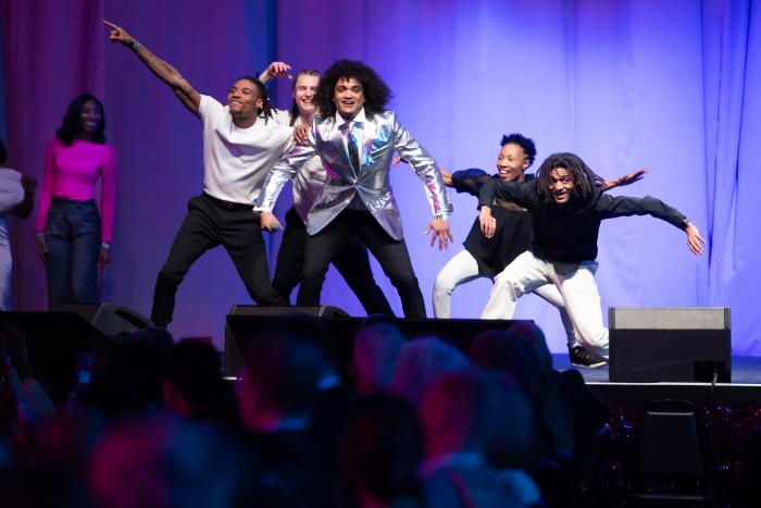 A group of dancers onstage