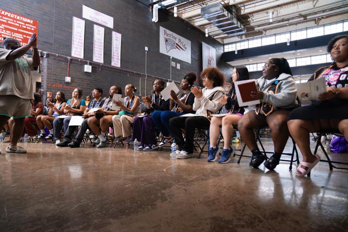 A large gathering of seated students.